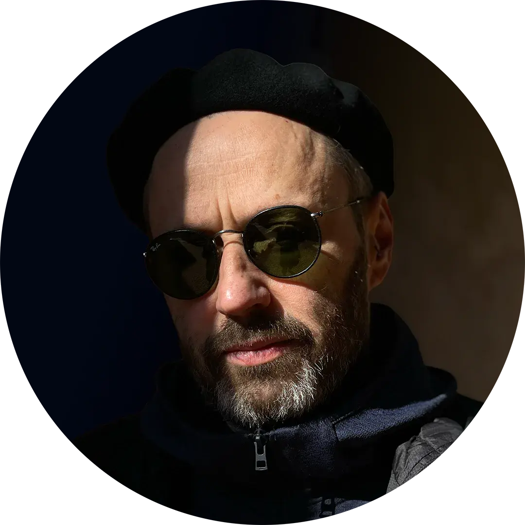 I'm supposed to be here wearing sunglasses and a very serious face — one of the traditional images of creative people ፦)